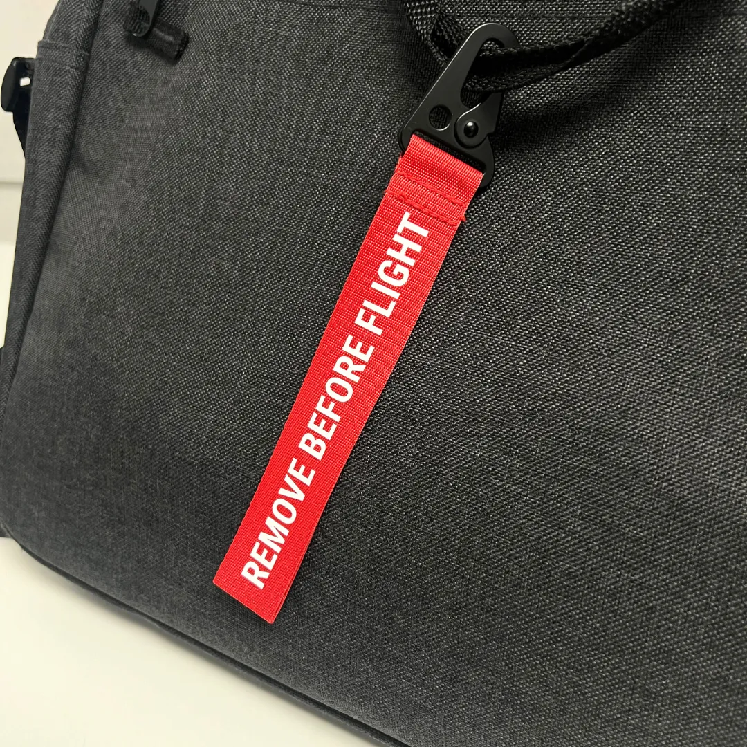 'REMOVE BEFORE FLIGHT' BAG TAG