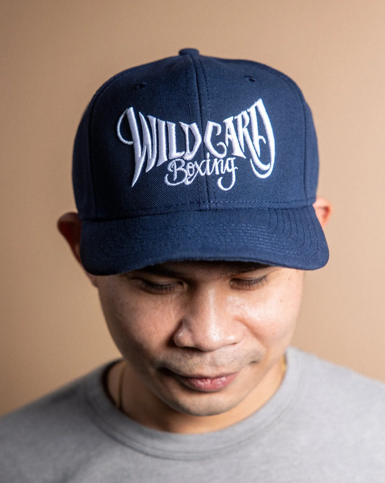 Wild Card Boxing Tag Logo Snapback Hat - Navy
